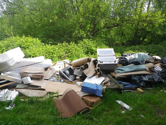 A pile of rubbish on the grass