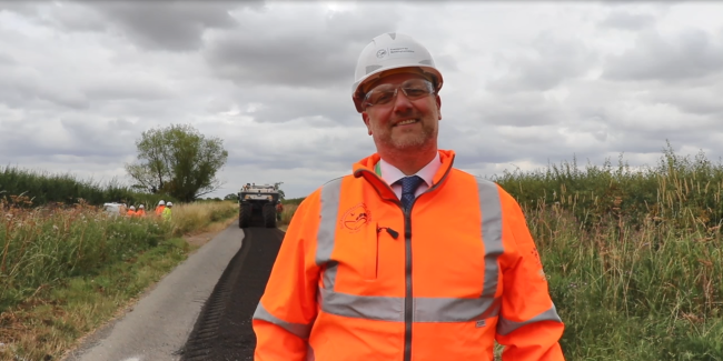 Cllr Steven Broadbent on site with the road crew