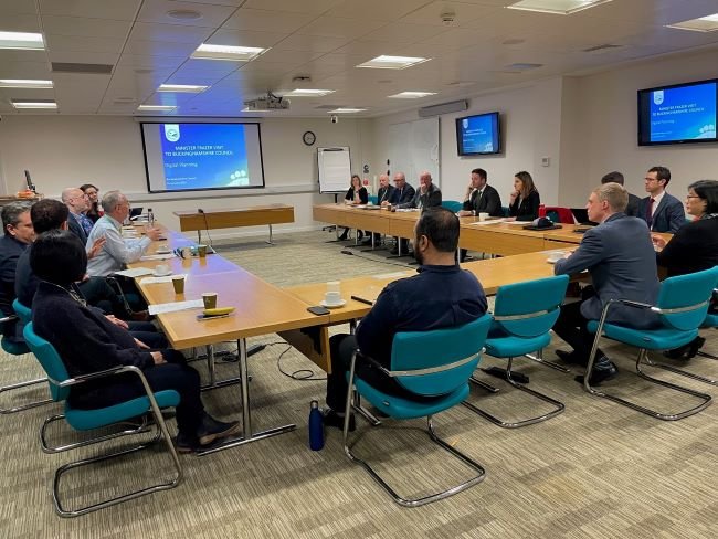 Housing and Planning Minister Lucy Frazer in a meeting room with Buckinghamshire Council Leader Martin Tett, Deputy Leader Gareth Williams and Cabinet Member for Planning and Regeneration, Peter Strachan