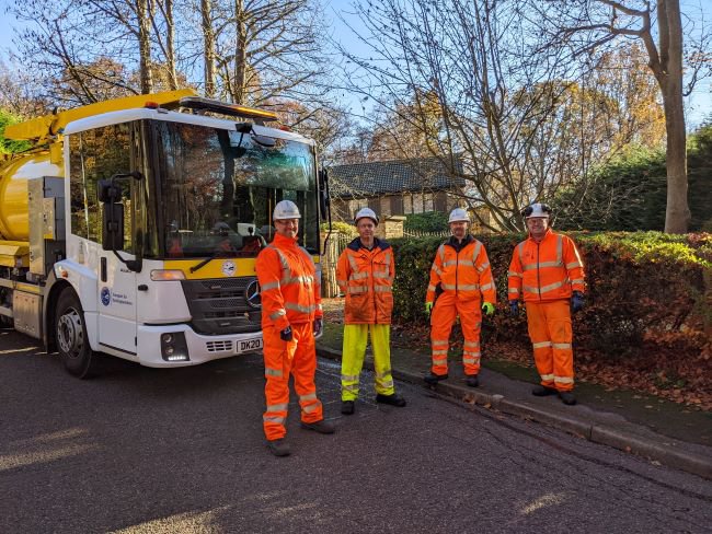 Steven Broadbent (far left), Cabinet Member for Transport, with members of Transport for Bucks and one of the gully cleaning trucks.