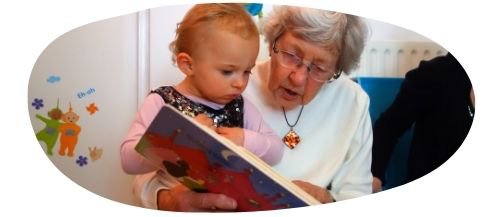 Grandma reading to grandchild