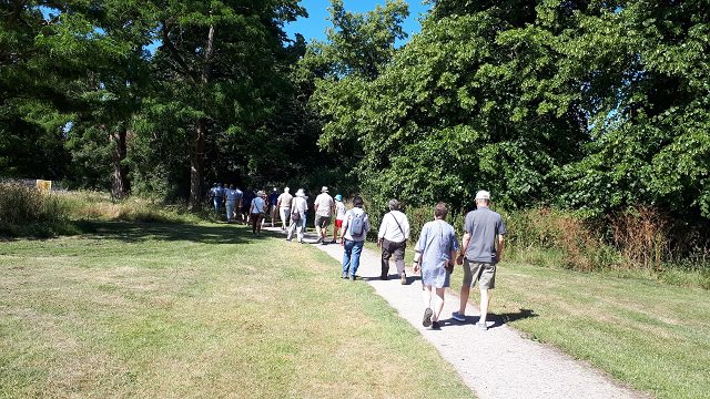 walkers walk on a path