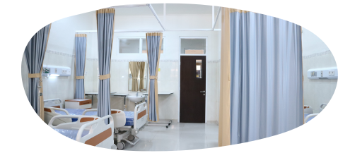 Hospital ward with empty beds