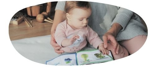 Mother reading with young child